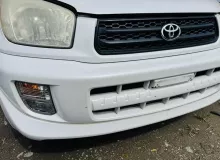 Планка под фары TOYOTA RAV4 2000/Цвет 064 5393142020 ZCA26W 1ZZFE, передняя Планка под фары TOYOTA RAV4 2000/Цвет 064 5393142020 ZCA26W 1ZZFE, передняя