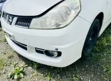 Бампер NISSAN WINGROAD 2007 F2022CV76A NY12 HR15DE, передний