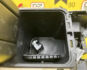 Бардачок между сиденьями