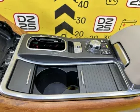 Бардачок между сиденьями Land Rover