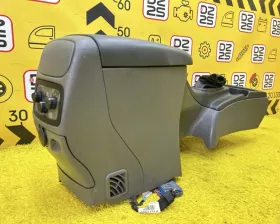 Бардачок между сиденьями General Motors