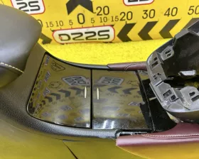 Бардачок между сиденьями Toyota