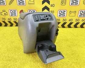 Бардачок между сиденьями General Motors