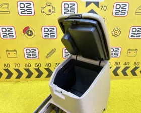 Бардачок между сиденьями Toyota