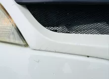 Решетка радиатора NISSAN NV200 2014 62310JX00A M20 HR16DE, передняя