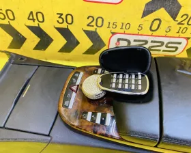 Бардачок между сиденьями Mercedes-Benz