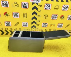 Бардачок между сиденьями Mitsubishi