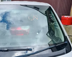 Лобовое стекло NISSAN