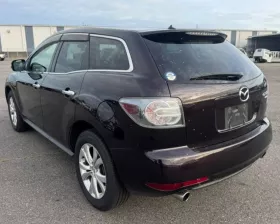 Петля капота Mazda