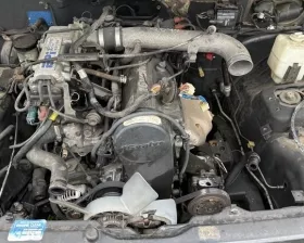 Тросик ручника SUZUKI