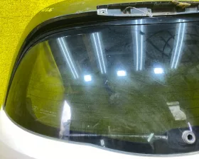 Стекло двери багажника Nissan