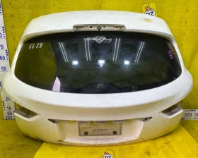 Стекло двери багажника Nissan