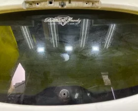 Стекло двери багажника Nissan