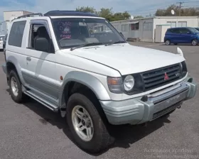 Компрессор пневмоподвески Mitsubishi