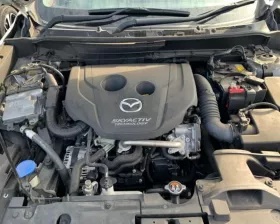 Мотор печки Mazda