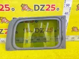 Стекло собачника NISSAN NV200 2013/Цвет K23 83301JX06B M20 HR16DE, заднее левое