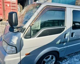 Лобовое стекло Nissan