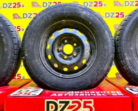 Колеса на дисках Nissan 5x114.3 c шинами Dunlop 185/80R14