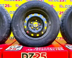Колеса на дисках Nissan 5x114.3 c шинами Dunlop 185/80R14