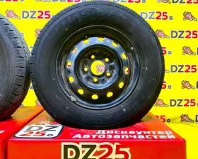 Колеса на дисках Nissan 5x114.3 c шинами Dunlop 185/80R14