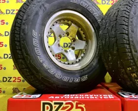 Колеса на дисках Berg 6x139.7 c шинами Bridgestone 285/75R16