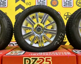 Колеса на дисках Nissan 4x100 c шинами Yokohama 185/65R15