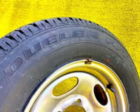 Колесо на диске Daihatsu 5x139.7 c шиной Bridgestone 195/80R15