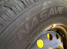 Колеса на дисках Nissan 4x114.3 c шинами Dunlop 165/80R14