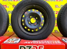 Колеса на дисках Nissan 4x114.3 c шинами Dunlop 165/80R14