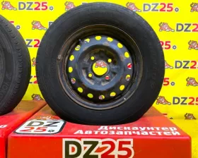 Колеса на дисках Nissan 4x114.3 c шинами Dunlop 165/80R14