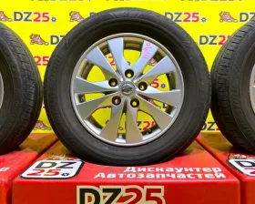 Колеса на дисках Nissan 5x114.3 c шинами Bridgestone 195/60R15