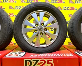 Колеса на дисках Nissan 5x114.3 c шинами Bridgestone 195/60R15