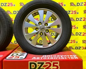 Колеса на дисках Nissan 5x114.3 c шинами Bridgestone 195/60R15