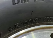 Колеса на дисках Chevrolet 6x127 c шинами Bridgestone 245/65R17