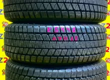 Колеса на дисках Chevrolet 6x127 c шинами Bridgestone 245/65R17