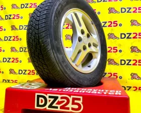 Колесо на диске Mitsubishi 5x114.3 c шиной Bridgestone 215/65R16