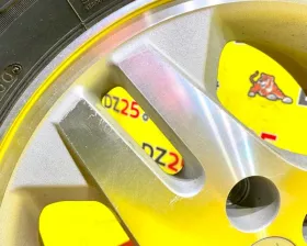 Колесо на диске Mitsubishi 5x114.3 c шиной Bridgestone 215/65R16