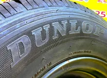 Колеса на дисках Nissan 4x114.3 c шинами Dunlop 165/80R14