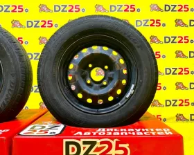 Колеса на дисках Nissan 4x114.3 c шинами Dunlop 165/80R14