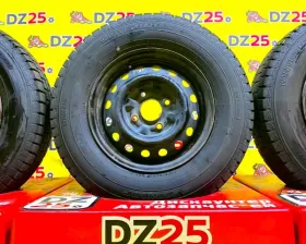 Колеса на дисках Nissan 4x114.3 c шинами Dunlop 175/80R14