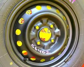 Колесо на диске Nissan 4x114.3 c шиной Yokohama 175/80R14