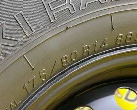 Колесо на диске Nissan 4x114.3 c шиной Yokohama 175/80R14