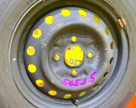 Колесо на диске Nissan 4x114.3 c шиной Toyo 165/80R14