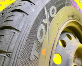 Колесо на диске Nissan 4x114.3 c шиной Toyo 165/80R14