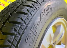 Колесо на диске Suzuki 5x139.7 c шиной Bridgestone 205/70R16