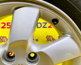 Колесо на диске Daihatsu 5x114.3 c шиной Bridgestone 215/65R16