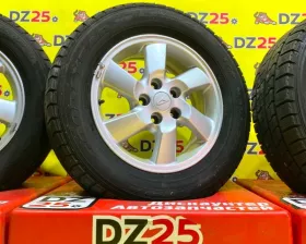 Колеса на дисках Daihatsu 5x114.3 c шинами Goodyear 215/65R16