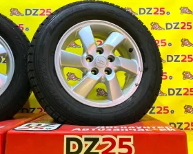 Колеса на дисках Daihatsu 5x114.3 c шинами Goodyear 215/65R16