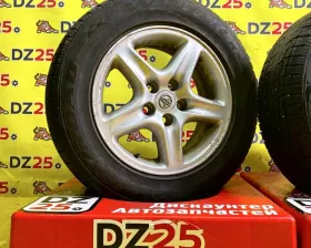 Колеса на дисках Toyota 5x114.3 c шинами Joyroad 215/65R16