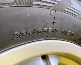 Колеса на дисках Toyota 6x139.7 c шинами Bridgestone 265/65R17
